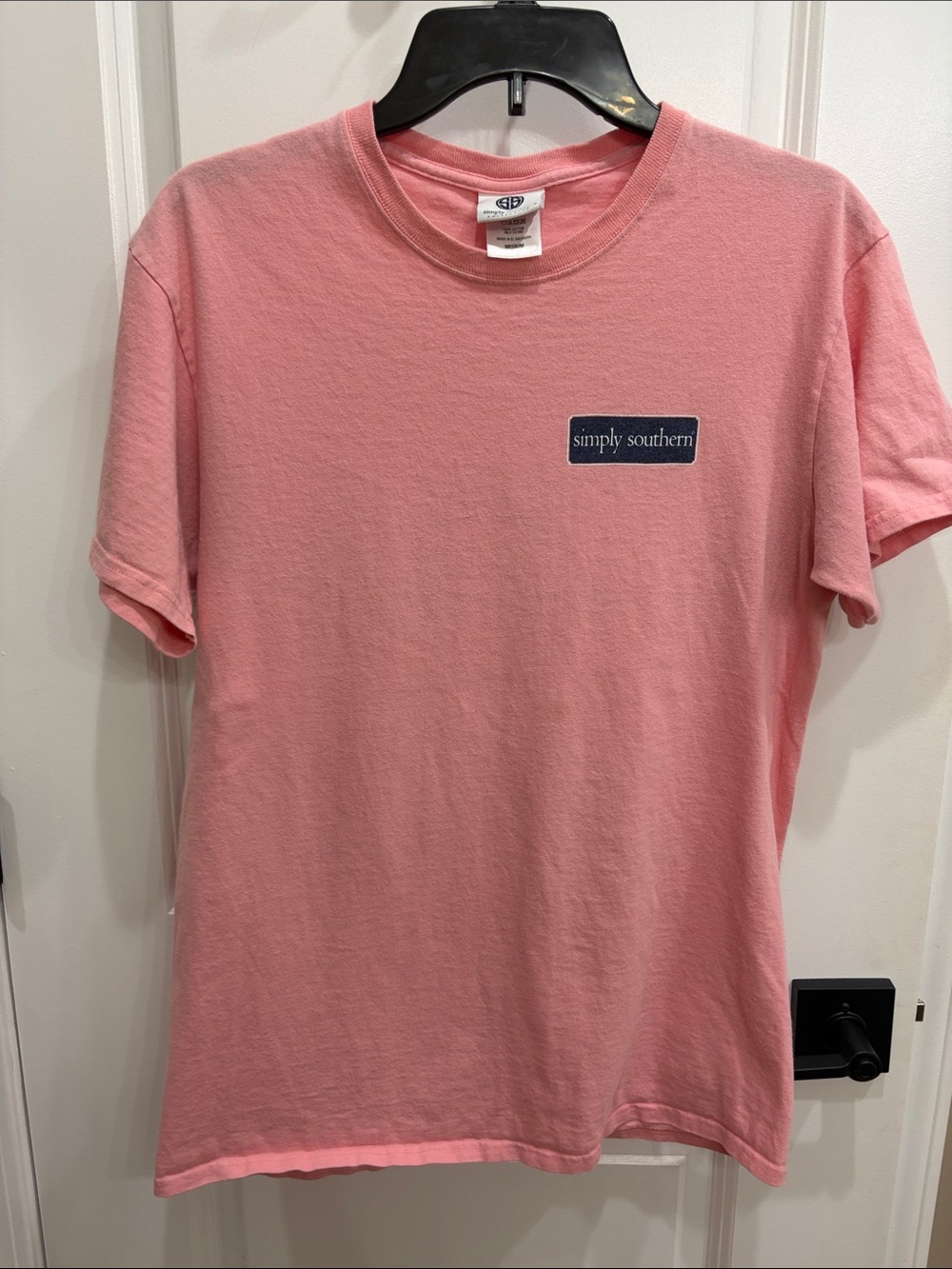Simply Southern women’s Coral Pink Short Sleeve Tee with Navy Logo